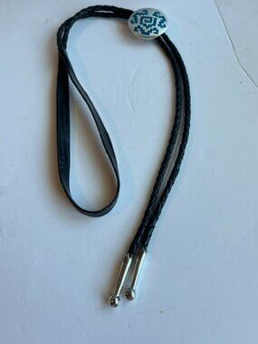 Western style leather bolo tie.